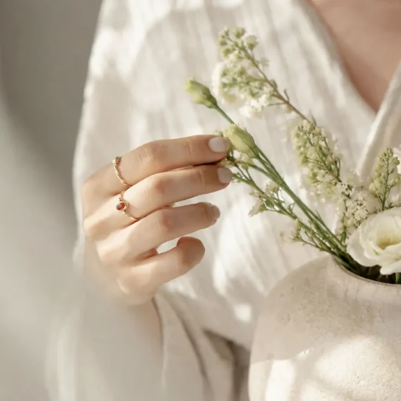 16_27_58 Person holding delicate white flowers